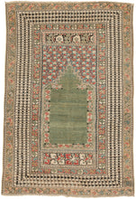 This Ghoirdes rug was woven in Western Anatolia during the 19th century. It features open and undulating sage mihrab with beautiful red and white flowers blossoming against a sky blue ground in it's stepped niche. Framed by a main border of simple yet sensational brown and white stripes. Beautifully drawn and perfectly balanced with a soft and calming palette of desirable tones. A rug which is both highly decorative and highly collectible at the same time.