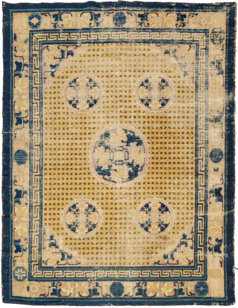 Ningxia Rug circa 1800 composed of a central mandala flanked by four smaller medallions over an intricate diamond lattice repeat. With a classic Ningxia palette that includes two shades of blue, brown, ivory, mauve and a desirable imperial yellow ground. The main border design features floral motifs on a mauve ground. The inner minor borders features a Greek key motif and the outer perimeter border features bands of both blue tones.