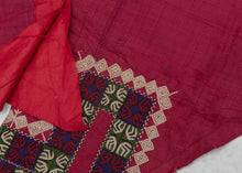 These trouser cuffs were handmade in Turkmenistan during the 20th Century.&nbsp;  Turkmen women traditionally wear colorful ankle length dresses with baggy trousers in contrasting color and decorated bands. These trousers feature wonderful detailed embroidery bands near the ankles in blue, red, green and ivory on a magenta cloth.