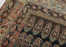 This Tabriz rug was handwoven during the early 20th century.

It features an all-over design of penguin-like&nbsp;botehs&nbsp;waddling row by row in alternating directions. The botehs shift slightly in proportion and placement giving the composition a wavy feel. Adding to the funky feel and nature of the rug the weaving style begins to change near the top from a crisper weave to a looser one while the colors used slowly begin to shift as the new weaver presumably began to run out of the original yarn.&nbsp;