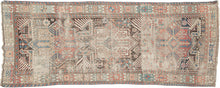 Akstafa caucasian late 19th century. It features a field three 8 pointed star medallions each flanked classic "Akstafa" birds. The Akstafa bird is a peacock like mythological bird. The main border is composed of alternating hooked cartouches. Shabby chic in a patinated and worn palette of red, blue, yellow and green with brown and ivory.