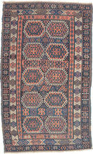 Sanjabi Kurd features a field of graphic hexagons filled with stylized protection symbols in handsome tones of blues, reds, aubergine and ivory on a deep navy ground. Each pair of hexagons is neatly separated by bands of geometric shapes. Well executed patterning that is very refined for type. Each of the three borders accentuate and balance the tones in the composition. Of particular not is the main ivory ground border which adds just the right amount of brightness