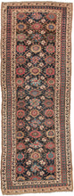 This rug was handwoven in Veramin during the early 20th century.

It features a classic mina khani design in a wide array of tones including red, pink, blue, green, purple and yellow which really pop against the deep&nbsp;surmah&nbsp;or blue/black ground. Uncharacteristically, a red and blue Laleh Abbasi pattern is utilized for the main border and flanked by ivory ground minor borders. Laleh Abbasi patterning is almost always used as a guard border around the perimeter of a rug. Other unique details include