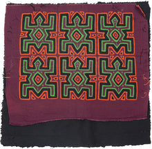 Vintage Mola cloth handmade by the Guna (previously spelled Kuna) people of the San Blas Islands.  Mola is a reverse appliqué technique, similar to the technique used in quilting but&nbsp;using multiple layers of different-colored cloth that are first sewn together before a design is created by cutting away different layers. These cloths are traditionally made in pairs to be worn on the front and back of women's blouses.  This Mola features a pattern of six turtles.  The fabric is in very good condition.