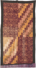 This batik patchwork was crafted in Indonesia during the 20th century.

Batik is a wax-resist technique that creates a distinctive style. This textile features a variety of batik designs that have been patchworked together into four quadrants creating a dynamic design in purples and yellows.&nbsp;