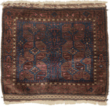 Afghan Timuri baluch It features a pattern jumbled "S" filled polygons in multiple shades of pink and purple on blue ground. Plush silky wool with a dark but lustrous complexion. Finished with kilim edges of latch hooked diamonds