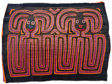 Vintage Mola cloth handmade by the Guna (previously spelled Kuna) people of the San Blas Islands.  Mola is a reverse appliqué technique, similar to the technique used in quilting but&nbsp;using multiple layers of different-colored cloth that are first sewn together before a design is created by cutting away different layers. These cloths are traditionally made in pairs to be worn on the front and back of women's blouses.  This Mola features what appear to be two bunnies.