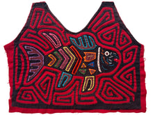 Vintage Mola cloth handmade by the Guna (previously spelled Kuna) people of the San Blas Islands.  Mola is a reverse appliqué technique, similar to the technique used in quilting but&nbsp;using multiple layers of different-colored cloth that are first sewn together before a design is created by cutting away different layers. These cloths are traditionally made in pairs to be worn on the front and back of women's blouses.  This Mola features a central fish and has cut into a blouse shape.  