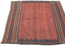 This&nbsp;Baluch sofreh was handwoven during the late 19th century in Afghanistan.

It features an open red abrashed field with a navy sawtoothed perimeter. It is finished on top and bottom with multiple bands of various "S" shape motifs which are rendered with a weft float technique. Given the size and the patterning, it was likely intended as a sofreh and used as such given the old repairs to the center.