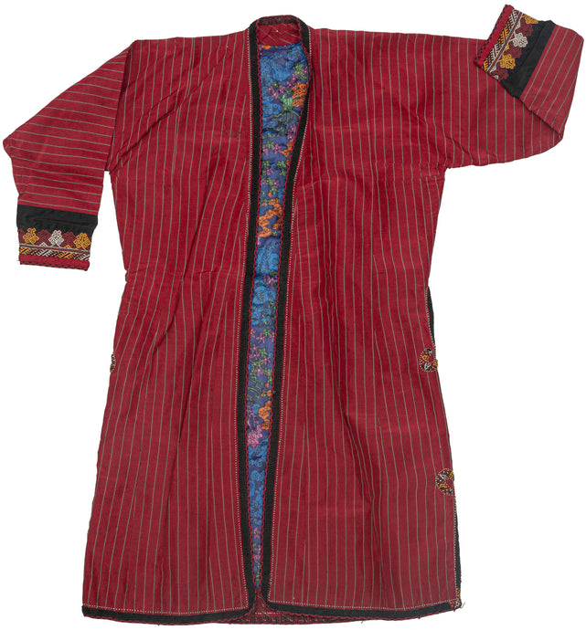 A hand sewn vintage silk chapan or overcoat from the Turkmen of Northern Afghanistan. 

A chapan which means 