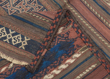 It is composed of various bands of graphic and well-contrasted geometric patterns that utilize a simple but effective palette which is reflective of classic Baluch aesthetics. The bands alternate between plain kilim weave and a carefully executed weft float technique that lends texture and depth to the piece enhancing its visual interest.&nbsp;