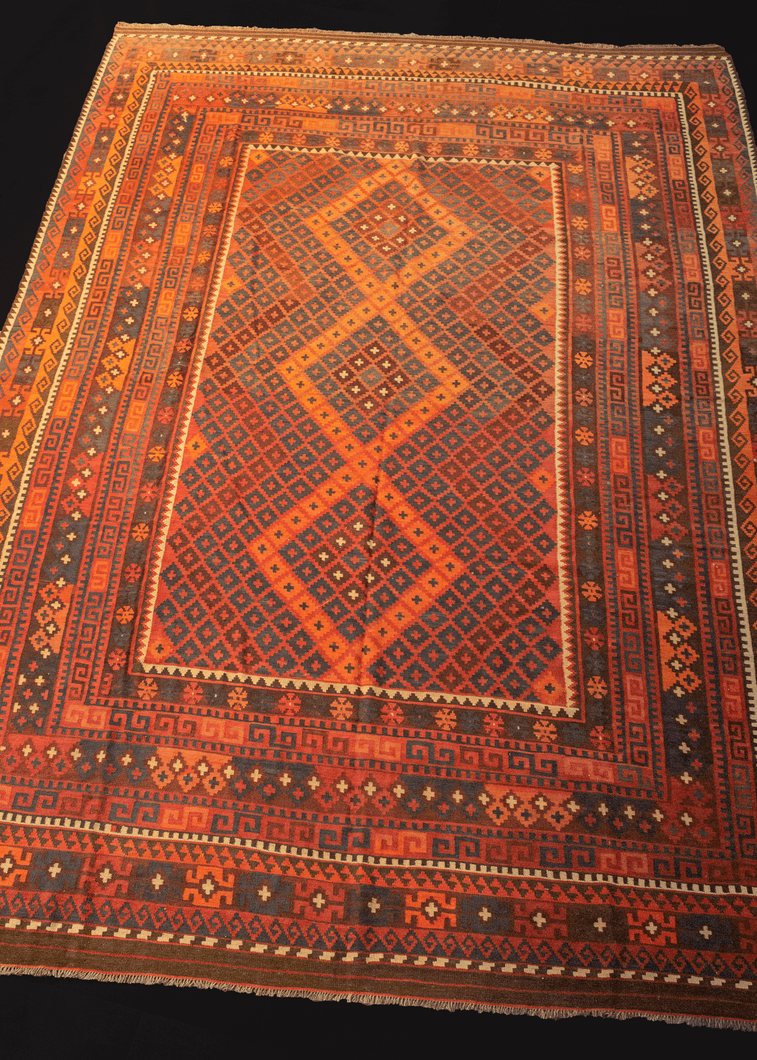 mid century maimana kilim with concentric diamond design in blue, red, and brown color palette